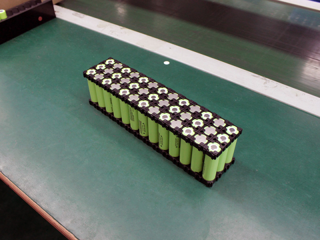Setting batteries into holder brackets